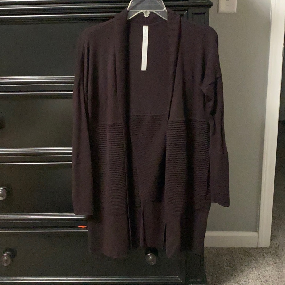Lululemon purple sit in lotus wrap size 4